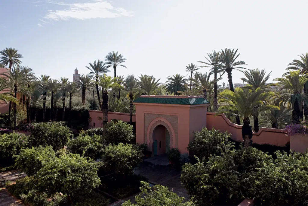 Royal Mansour gardens with a Moorish gate and Koutoubia views, luxury Marrakech wedding venue