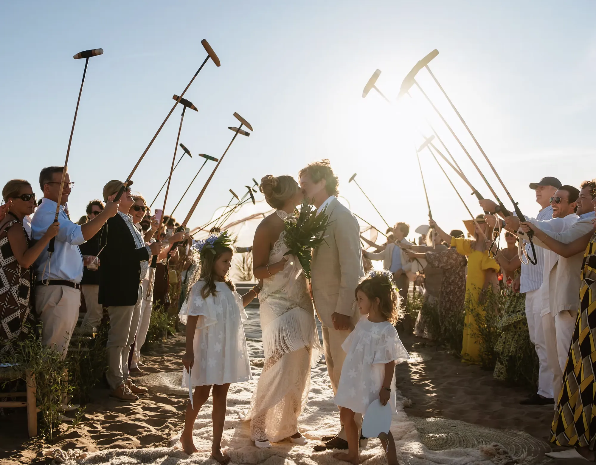 Bride and groom photographed at golden hour in the Agafay Desert, illustrating Morocco wedding photographer cost by location