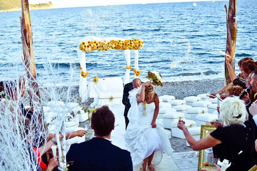 Coastal wedding ceremony in Essaouira, Morocco at golden hour